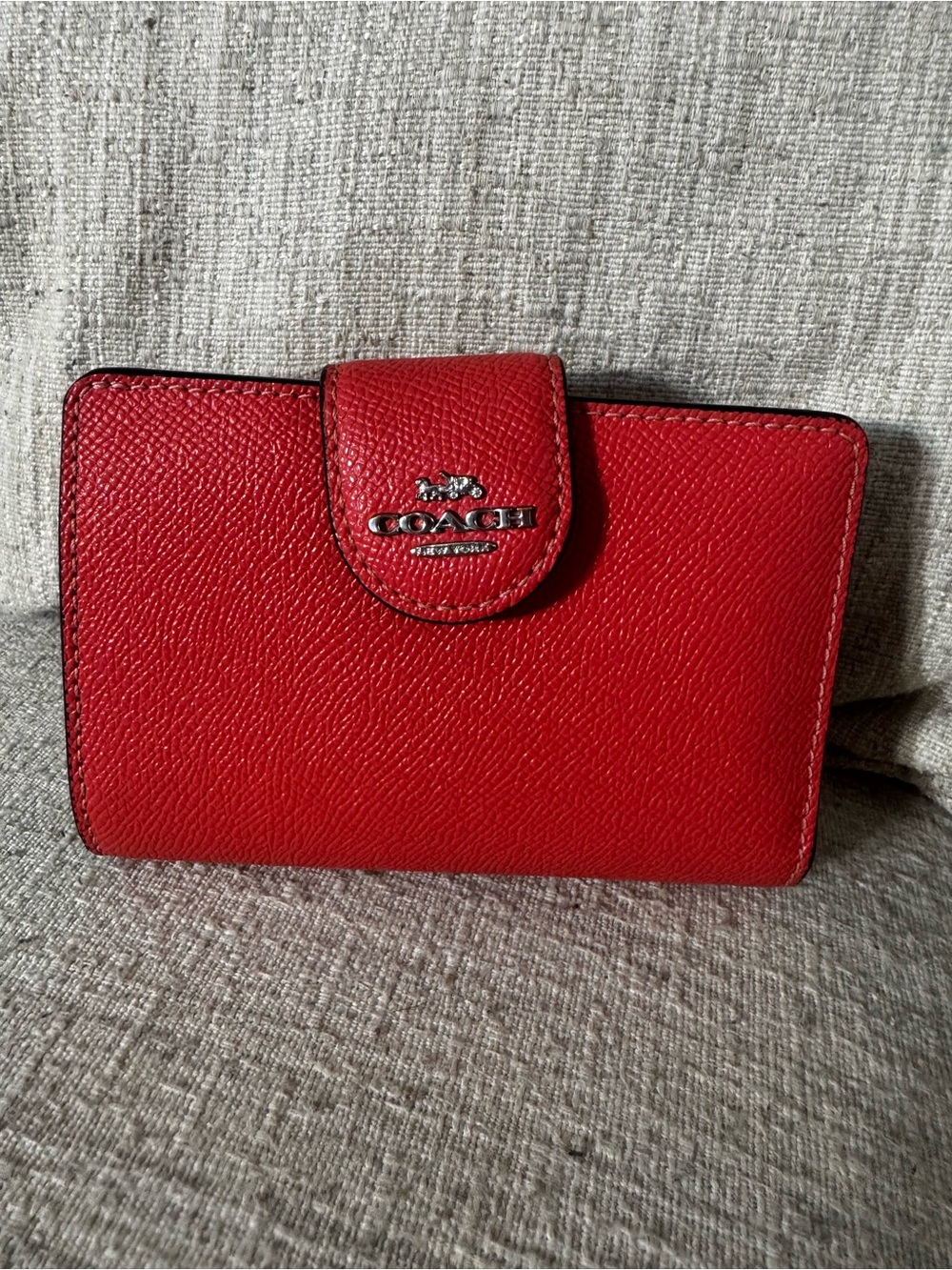 Coach Orange Leather Wallet with Tab Closure